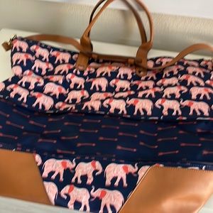 Stella & Dot getaway bag. Expandable. Super durable. Elephant motif.